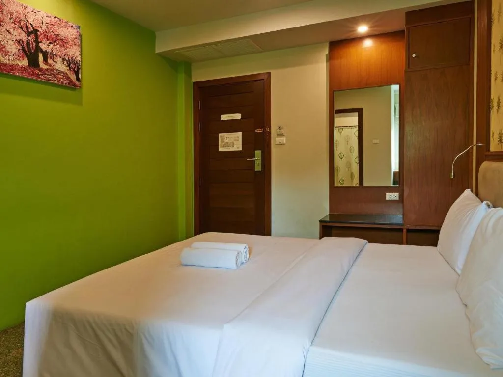 Bed in Phuket Ecozy Hotel