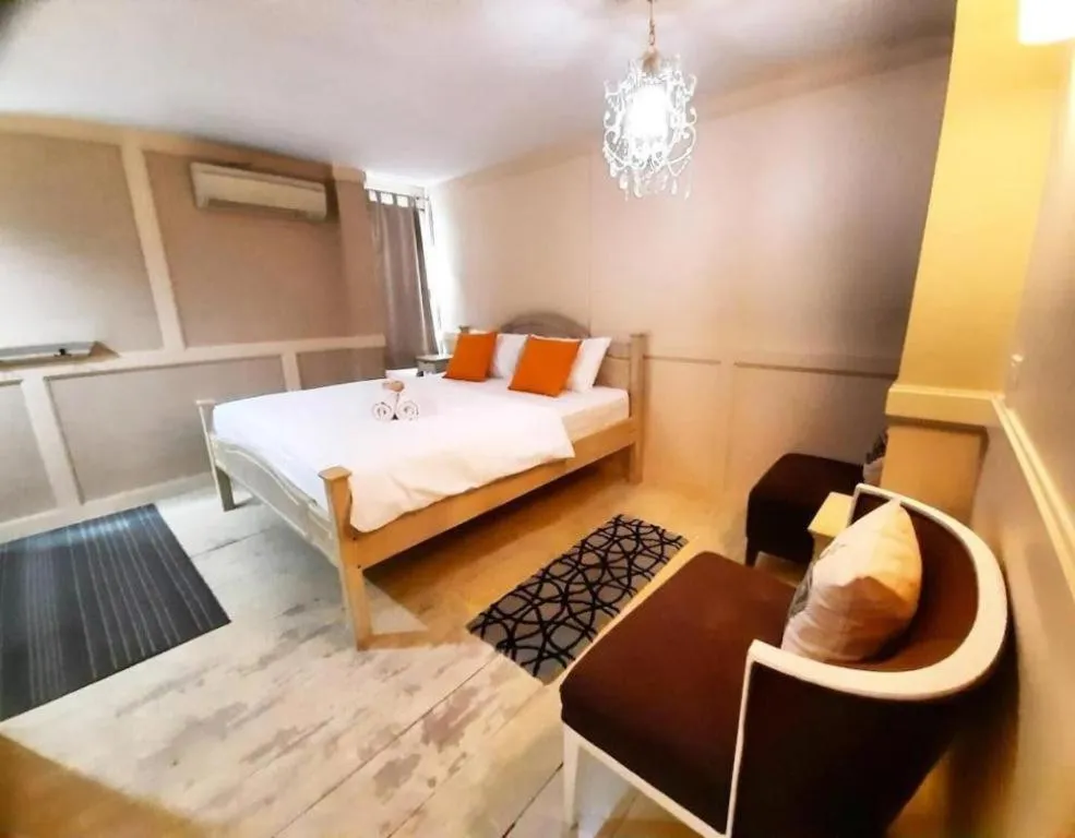 Bed in The Royal Chiangkhan Boutique Hotel