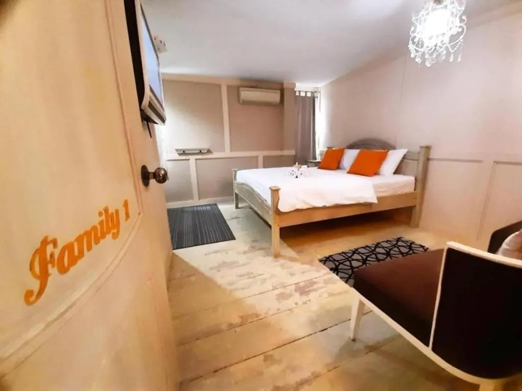 Bed in The Royal Chiangkhan Boutique Hotel