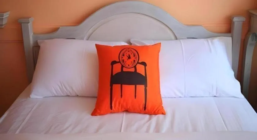 Bed in The Royal Chiangkhan Boutique Hotel