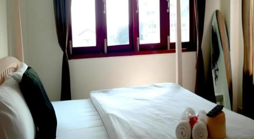 Bed in The Royal Chiangkhan Boutique Hotel