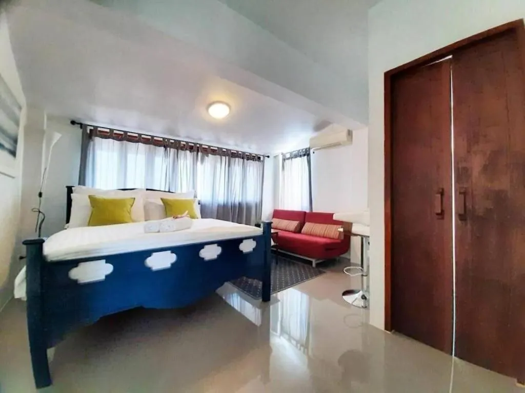 Bed in The Royal Chiangkhan Boutique Hotel