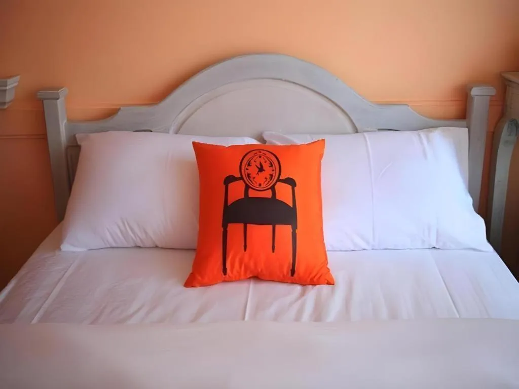 Bed in The Royal Chiangkhan Boutique Hotel