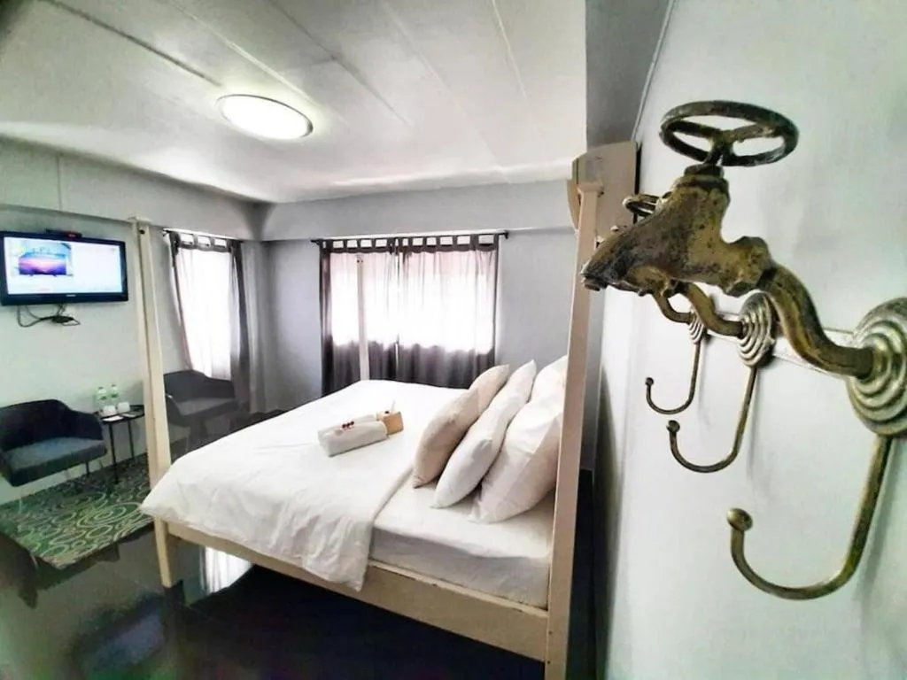 Bed in The Royal Chiangkhan Boutique Hotel