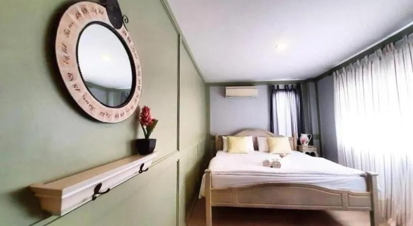 Bed in The Royal Chiangkhan Boutique Hotel