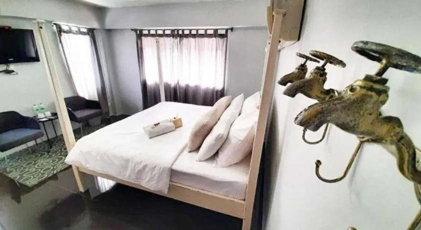 Bed in The Royal Chiangkhan Boutique Hotel