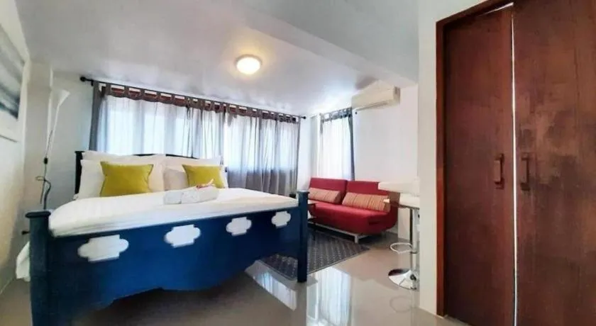 Bed in The Royal Chiangkhan Boutique Hotel