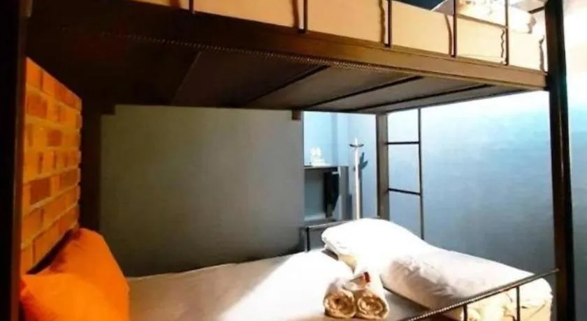 Bed in The Royal Chiangkhan Boutique Hotel