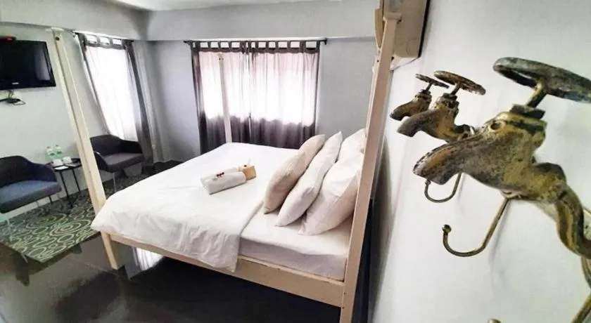 Bed in The Royal Chiangkhan Boutique Hotel