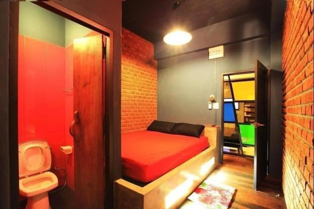 Bed in The Royal Chiangkhan Boutique Hotel