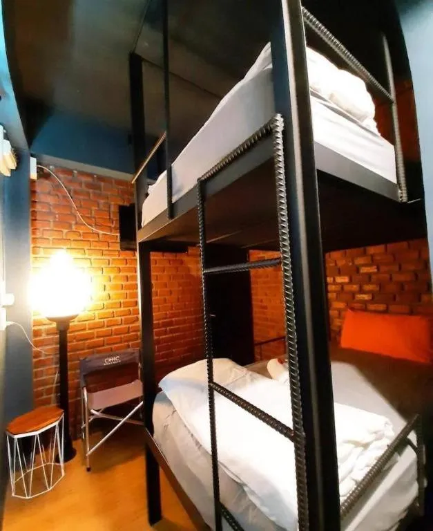 Bed in The Royal Chiangkhan Boutique Hotel