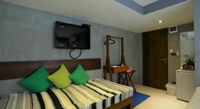 Bed in Chic Chiangkhan Hotel