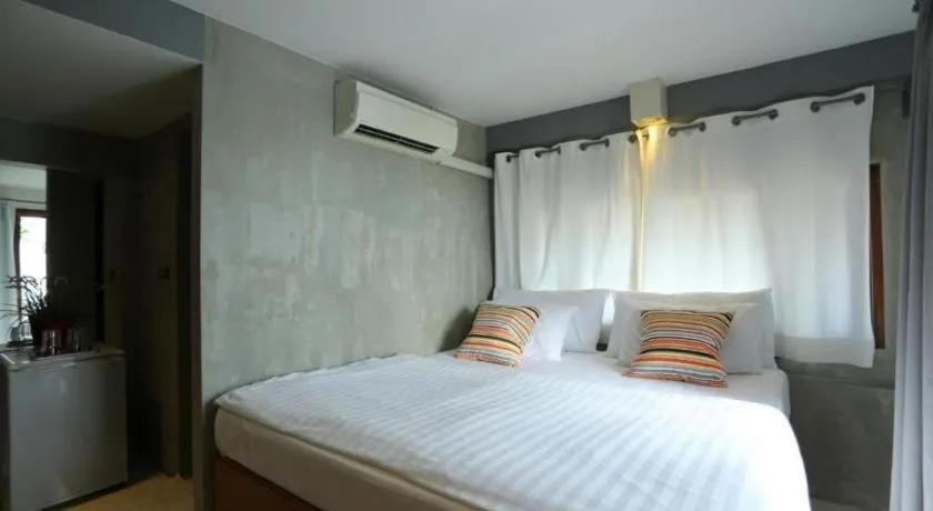 Bed in Chic Chiangkhan Hotel