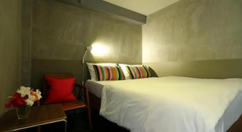 Bed in Chic Chiangkhan Hotel