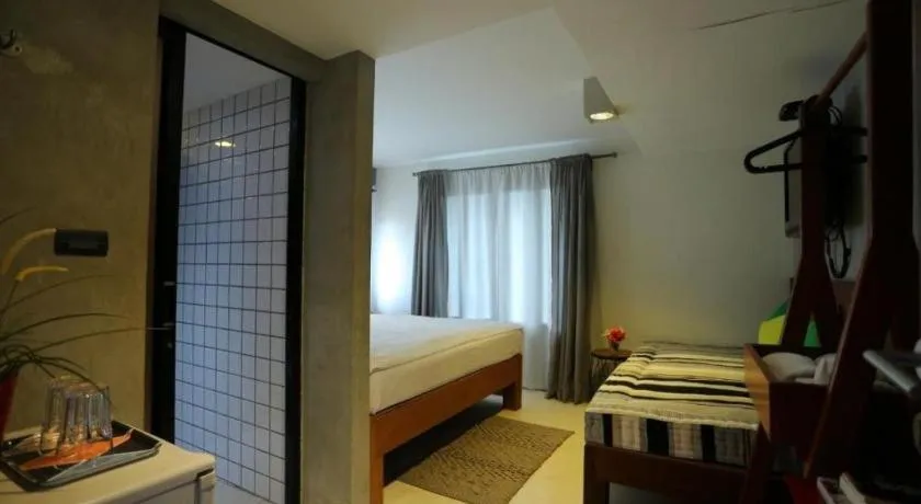 Bed in Chic Chiangkhan Hotel