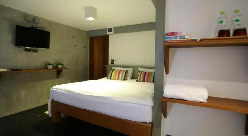 Bed in Chic Chiangkhan Hotel