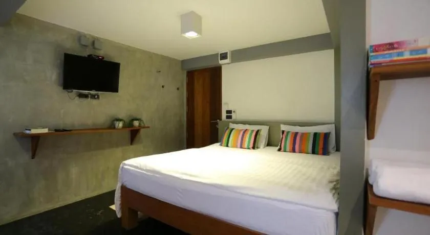 Bed in Chic Chiangkhan Hotel