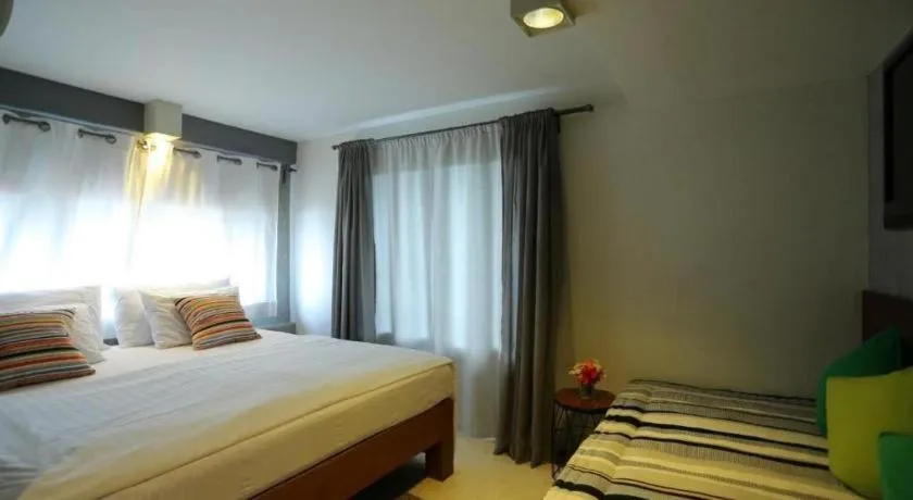 Bed in Chic Chiangkhan Hotel