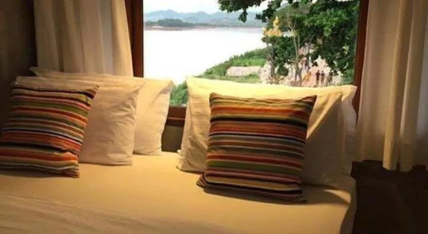 Bed in Chic Chiangkhan Hotel