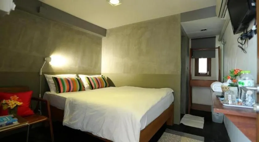 Bed in Chic Chiangkhan Hotel