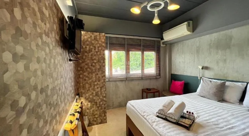 Bed in Chic Chiangkhan Hotel