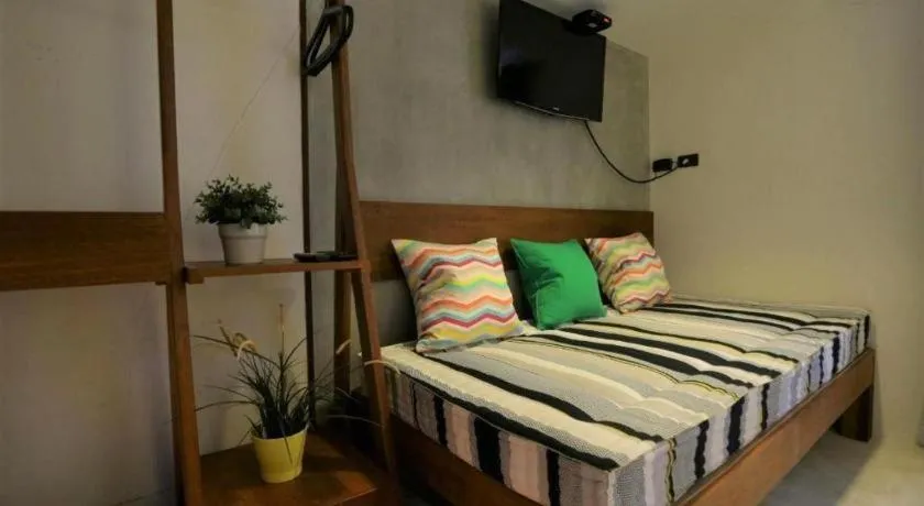 Bed in Chic Chiangkhan Hotel