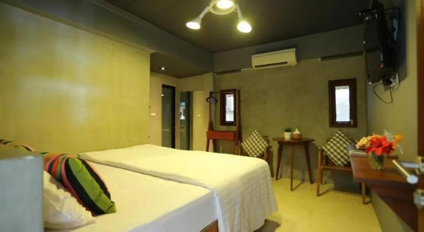 Bed in Chic Chiangkhan Hotel