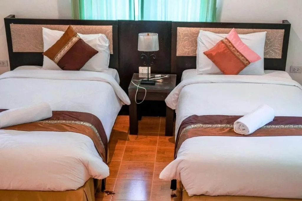 Bed in Sida Resort Hotel Nakhon Nayok