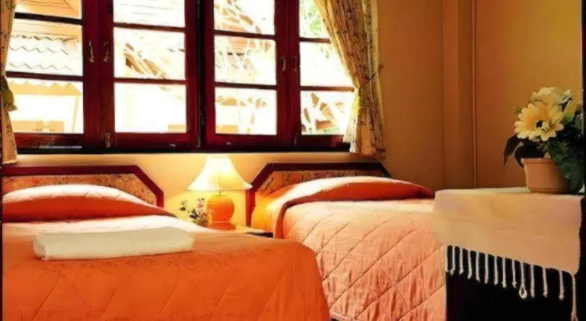 Bed in Sida Resort Hotel Nakhon Nayok