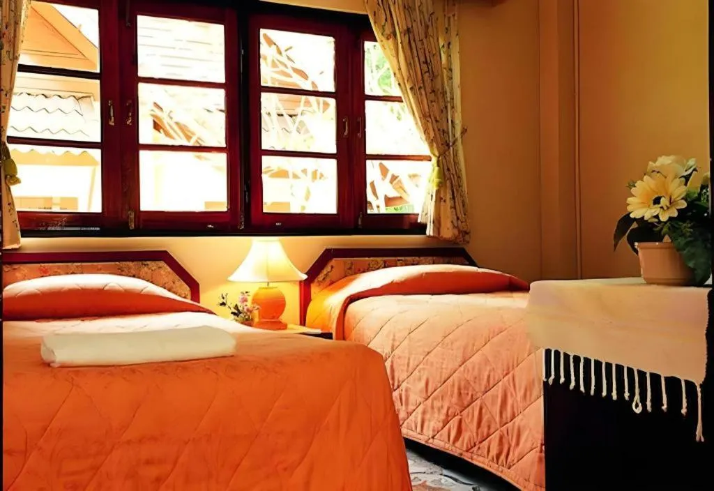 Bed in Sida Resort Hotel Nakhon Nayok