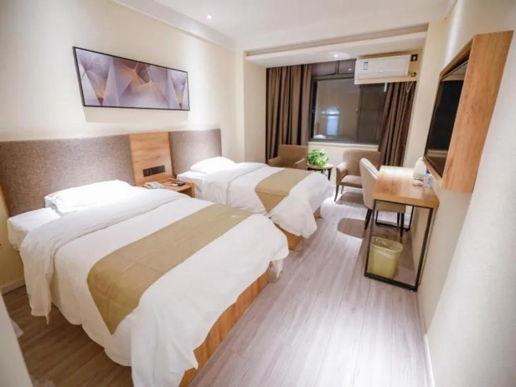 Bed in GreenTree Inn Hefei Chenghuangmiao San Xiao Kou Subway Station Hotel