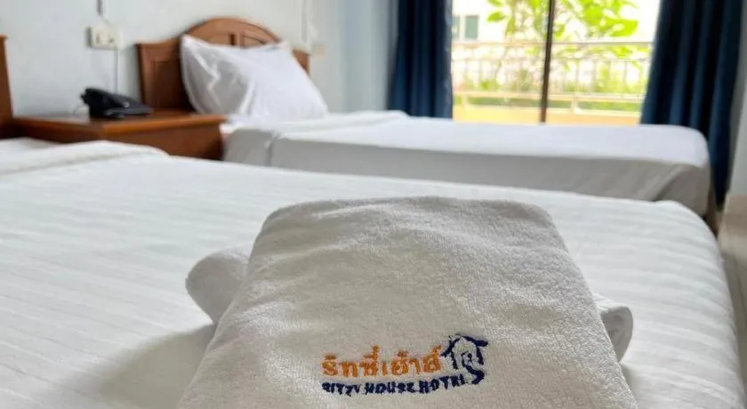 Bed in Ritzy House Hotel