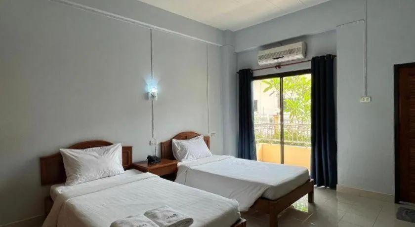 Bed in Ritzy House Hotel