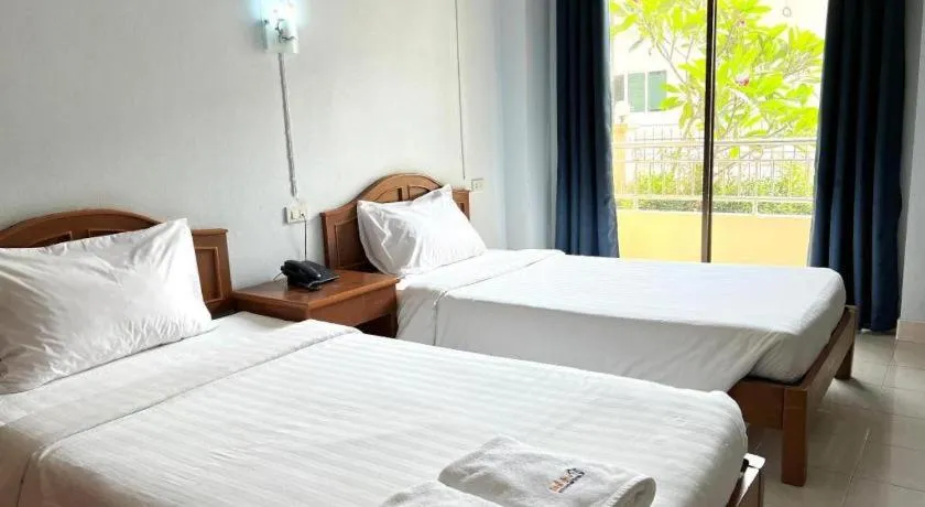 Bed in Ritzy House Hotel