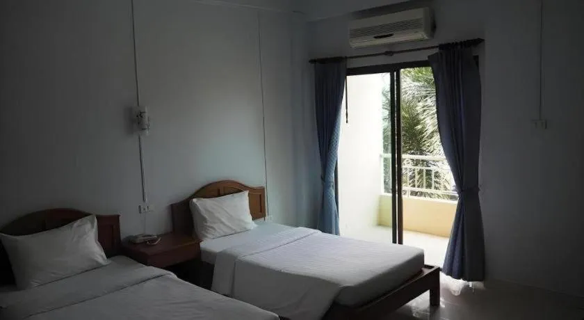 Bed in Ritzy House Hotel