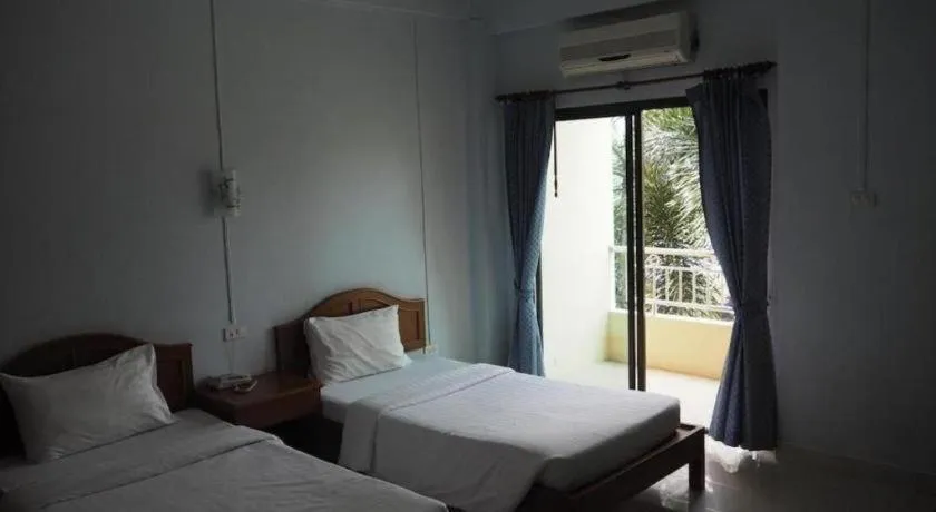 Bed in Ritzy House Hotel