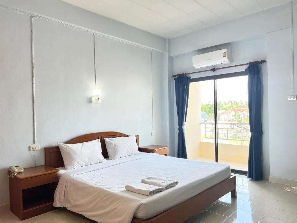 Bed in Ritzy House Hotel