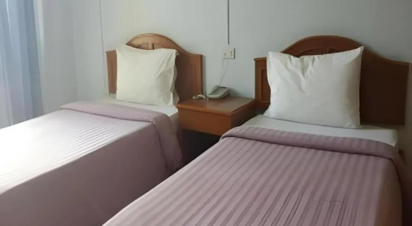 Bed in Ritzy House Hotel