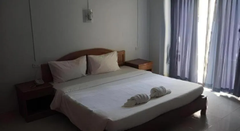 Bed in Ritzy House Hotel