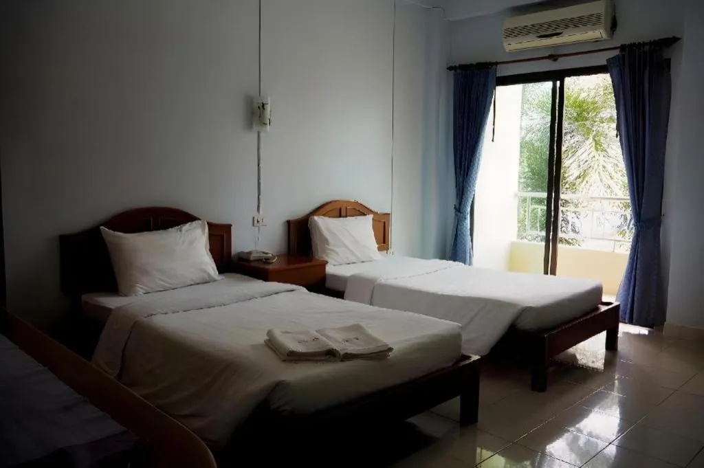 Bed in Ritzy House Hotel