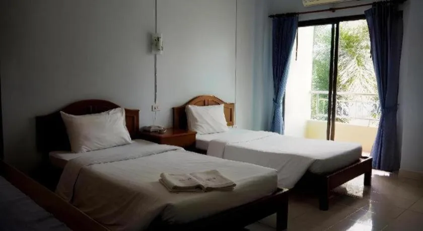 Bed in Ritzy House Hotel