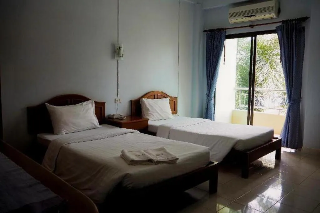 Bed in Ritzy House Hotel