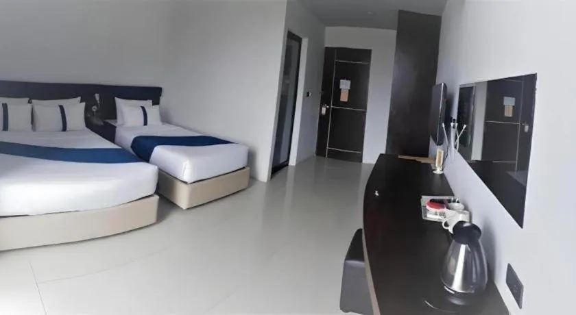 Bed in Ingtara Hotel