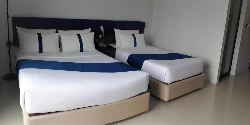 Bed in Ingtara Hotel