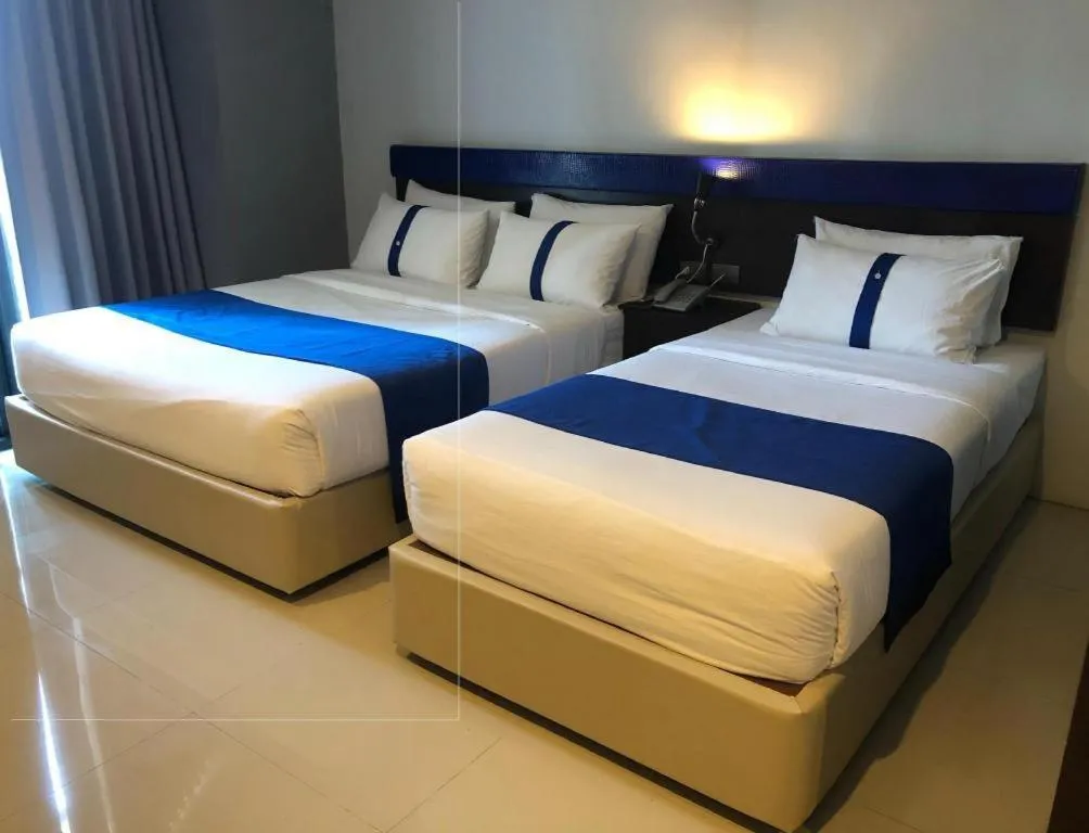 Bed in Ingtara Hotel