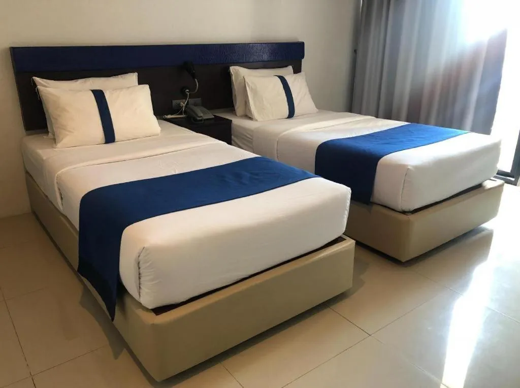 Bed in Ingtara Hotel