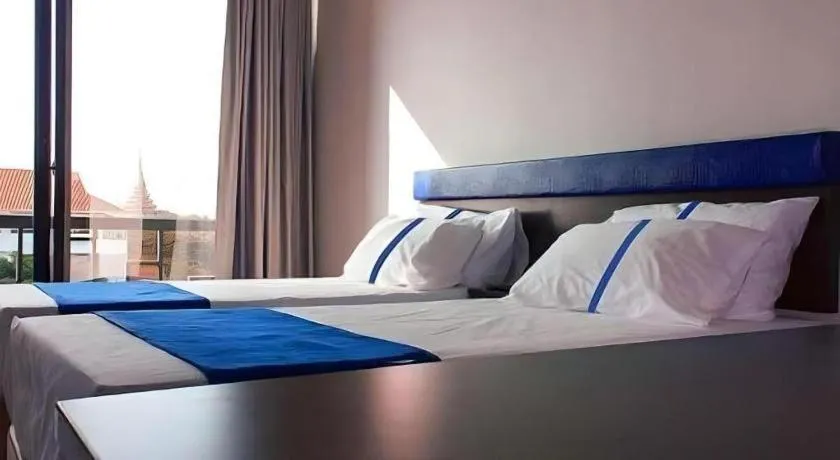 Bed in Ingtara Hotel