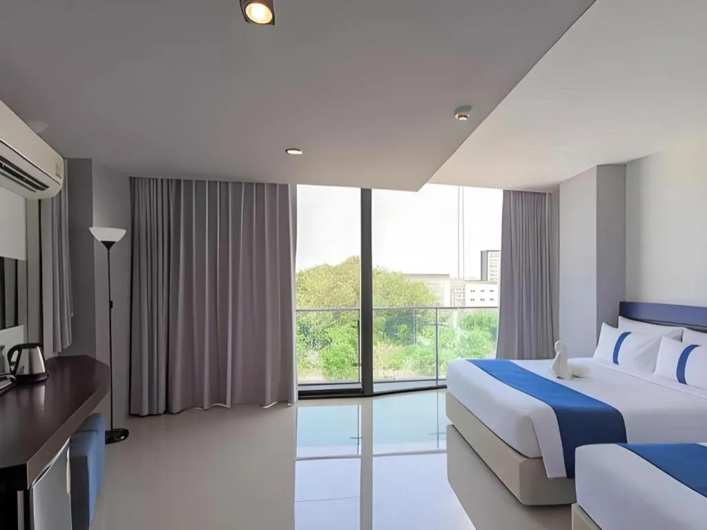 Bed in Ingtara Hotel