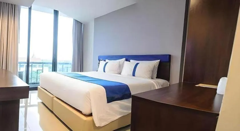 Bed in Ingtara Hotel