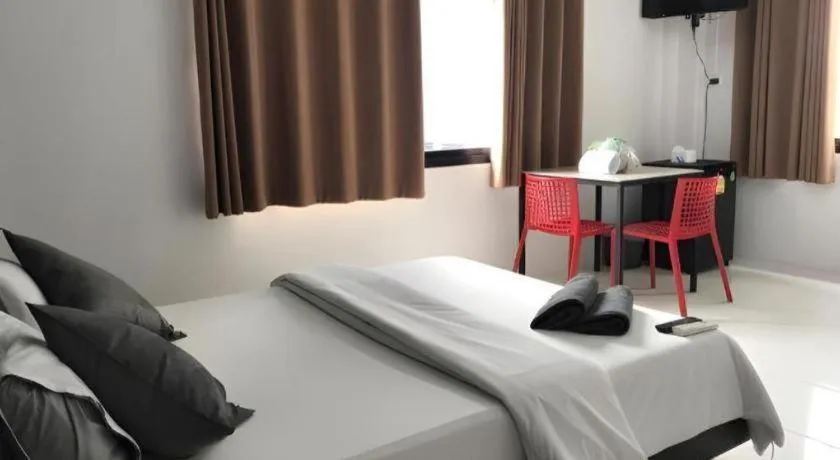 Bed in The Color Express Hotel